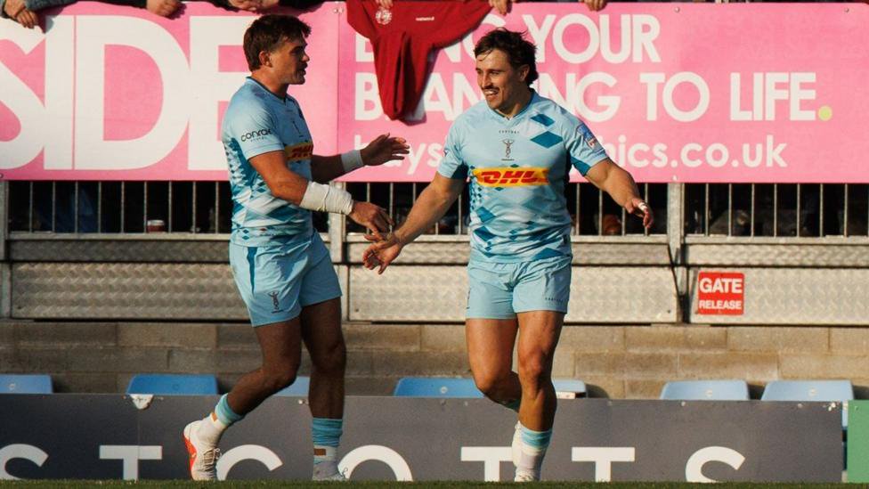 Cadan Murley celebrates scoring the opening try with George Furbank.