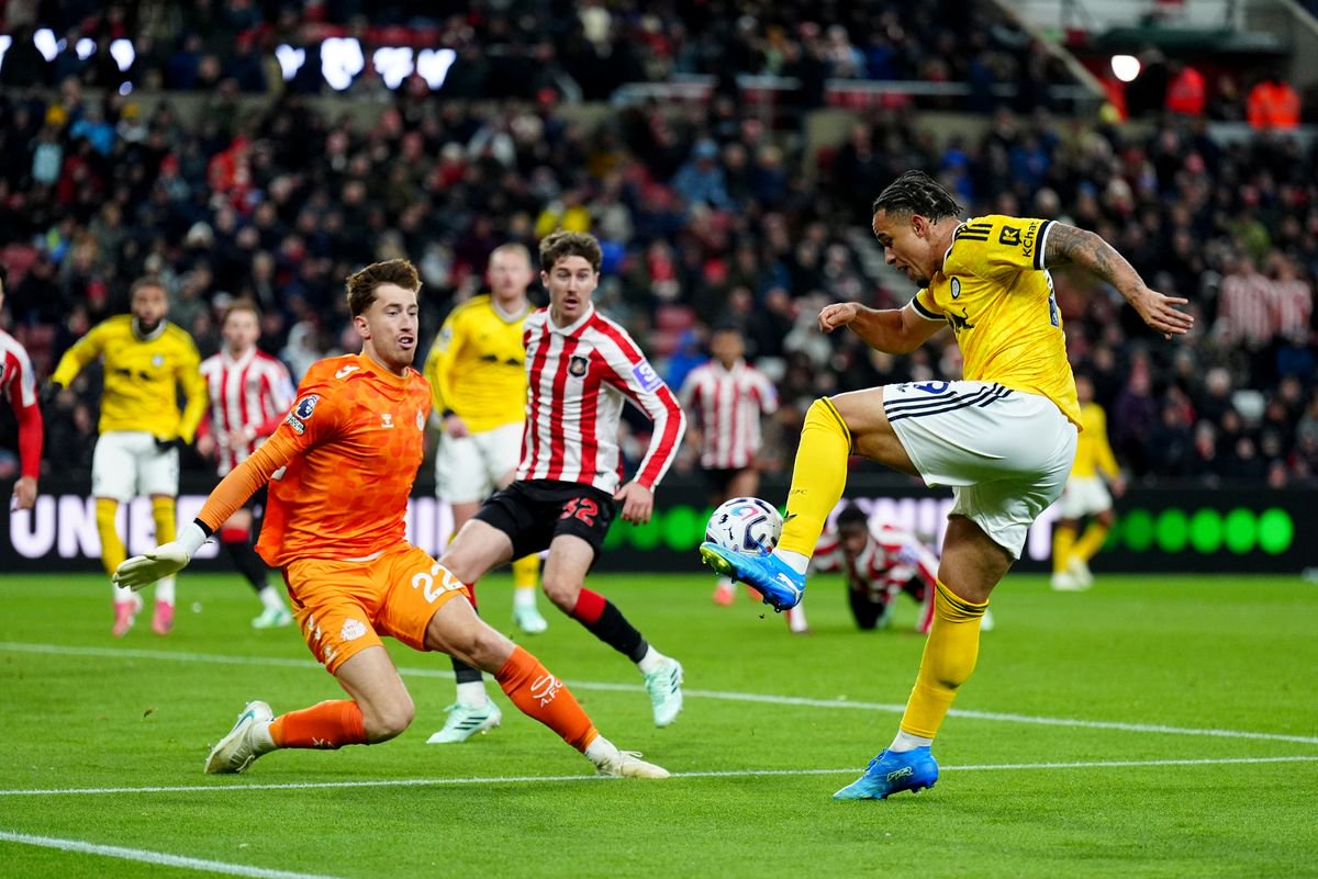 Leeds United's Noah Okafor (right) has a shot at goal 