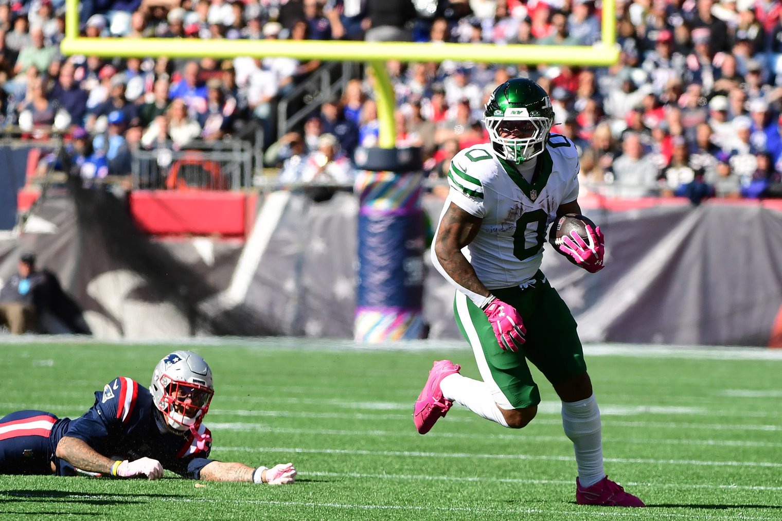 Oct 18, 2026; Foxborough, Massachusetts, USA;  New York Jets running back Braelon Allen (0) runs with the ball in the first half against the New England Patriots at Gillette Stadium.  Mandatory Credit: Bob DeChiara-Imagn Images
