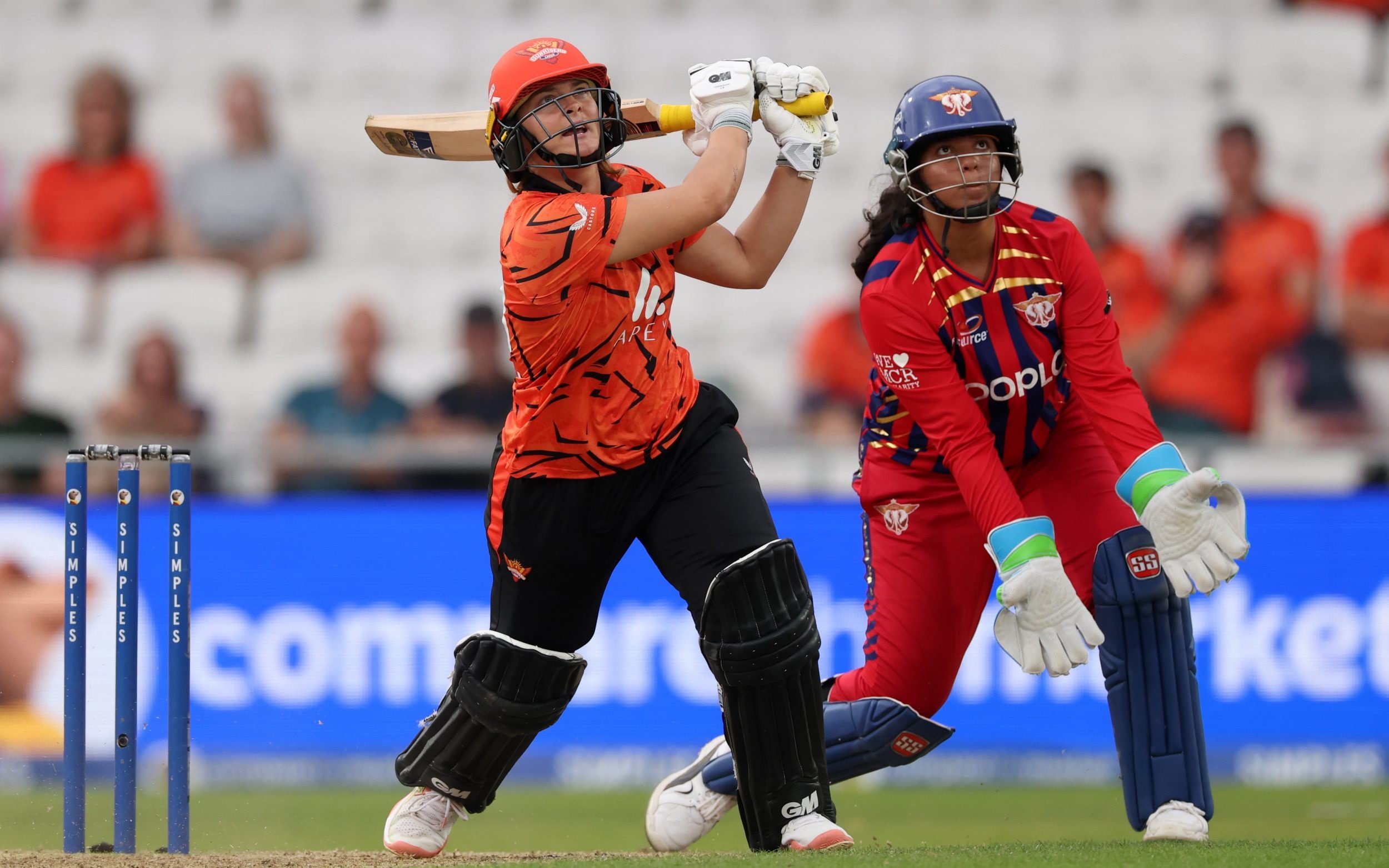 Dani Gibson slogs one up in the air playing for Sunrisers Leeds