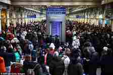 Passengers queue for Eurostar trains at London St Pancras station on December 31 last year