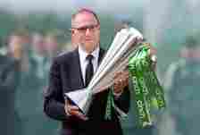 Former Celtic manager Martin O'Neill walks up towards the stadium with the SPL trophy during the Cinch Scottish Premiership match between Celtic an...