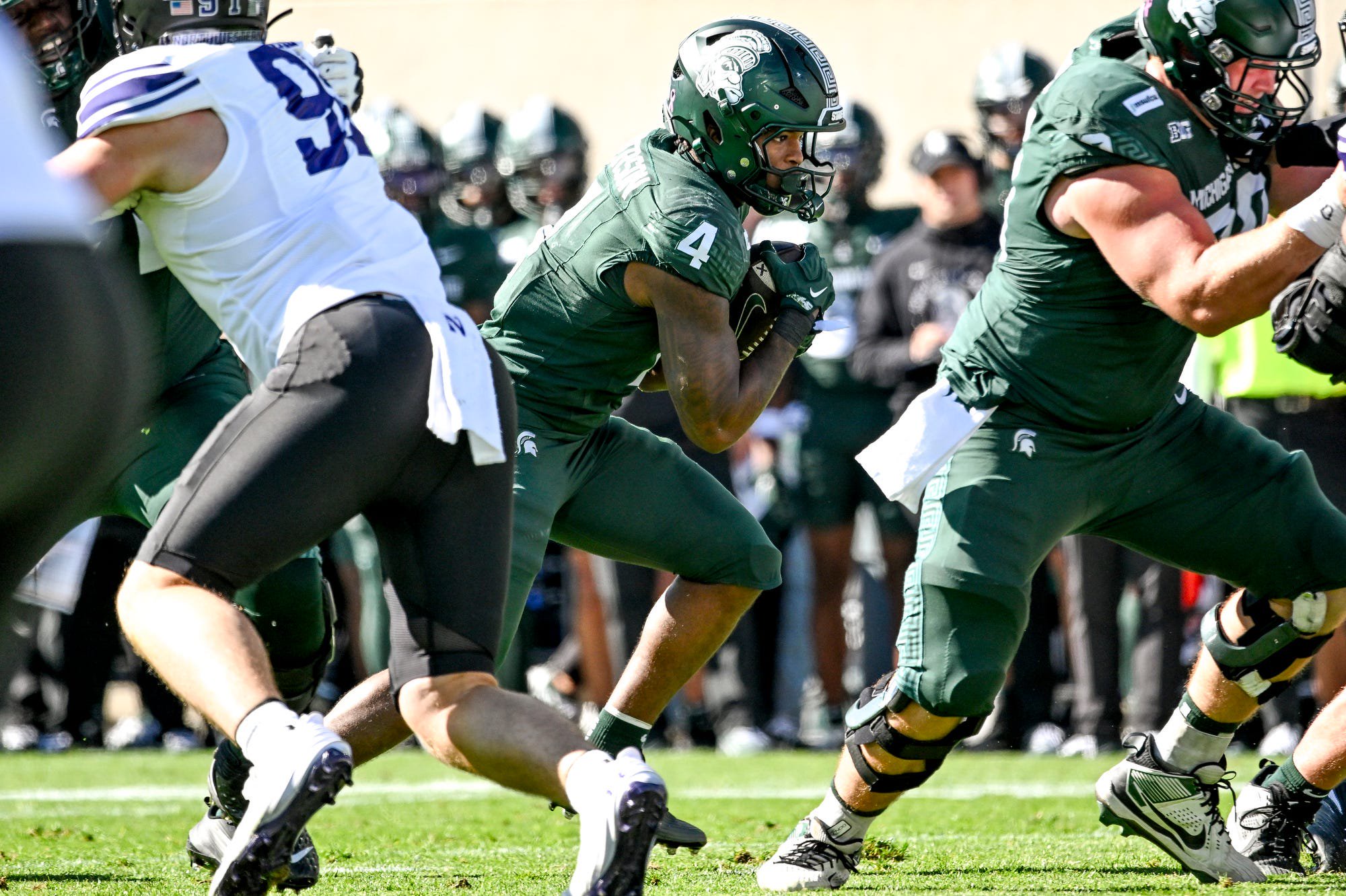 Michigan State’s Jaziun Patterson runs for a gain against Northwestern during the first quarter on Saturday, Oct. 17, 2026, at Spartan Stadium in East Lansing.