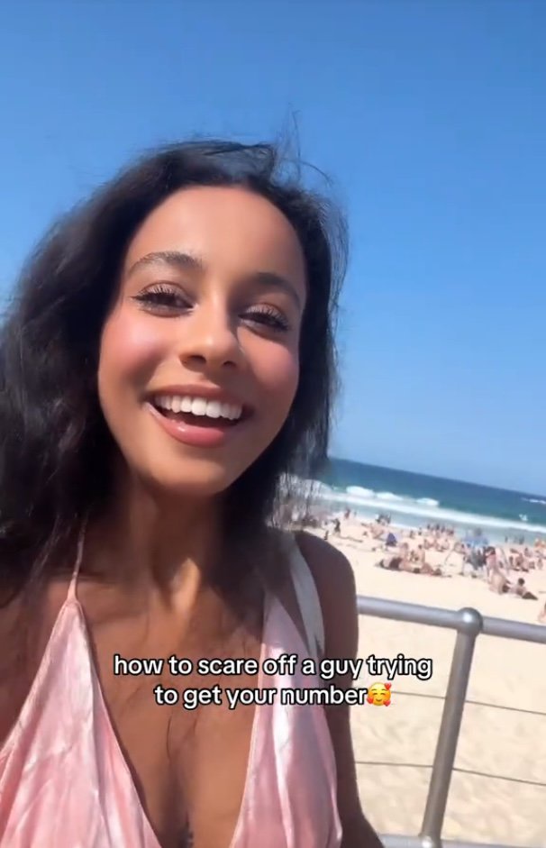 Woman reveals genius tactic to fend off men’s unwanted advances at the beach