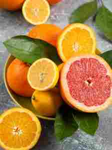 vertical-photo-fresh-citrus-fruits-yellow-bowl_114579-64441
