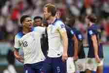 Jude Bellingham consoles Harry Kane after the England captain had missed a penalty
