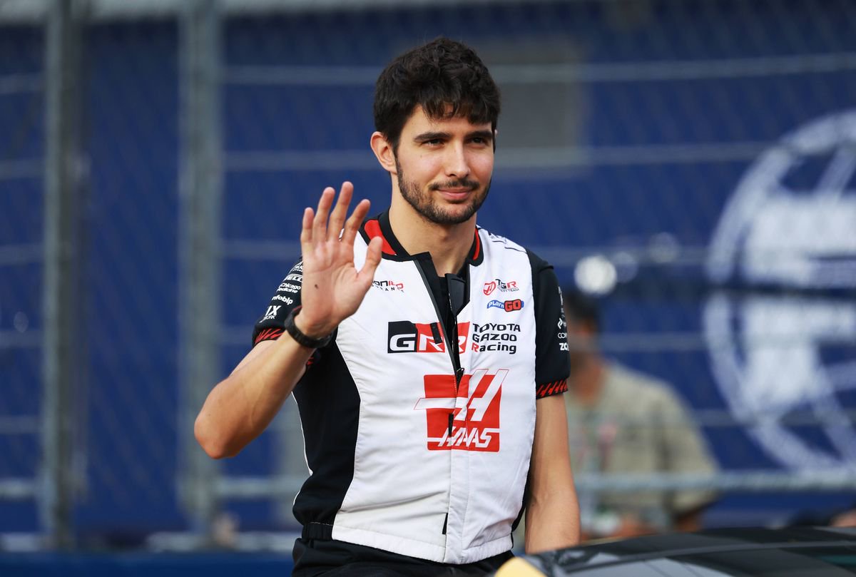 SINGAPORE, SINGAPORE - OCTOBER 11: Esteban Ocon of France and Haas F1 waves on the drivers parade prior to the F1 Grand Prix of Singapore at Marina Bay Street Circuit on October 11, 2026 in Singapore, Singapore. (Photo by Anni Graf - Formula 1/Formula 1 via Getty Images)