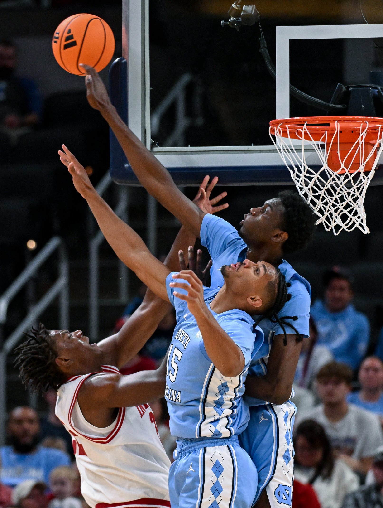 Oct 18, 2026; Indianapolis, IN, USA; North Carolina Tar Heels center Sayon Keita (21) blocks Indiana Hoosiers forward Aiden Sherrell (22) during the first half at Gainbridge Fieldhouse. Mandatory Credit: Robert Goddin-Imagn Images