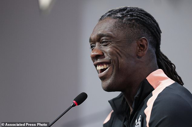 Clarence Seedorf smiles during a news conference presenting him as the new head coach of the Corinthians soccer team, in Sao Paulo, Wednesday, Oct. 14, 2026. (AP Photo/Ettore Chiereguini)
