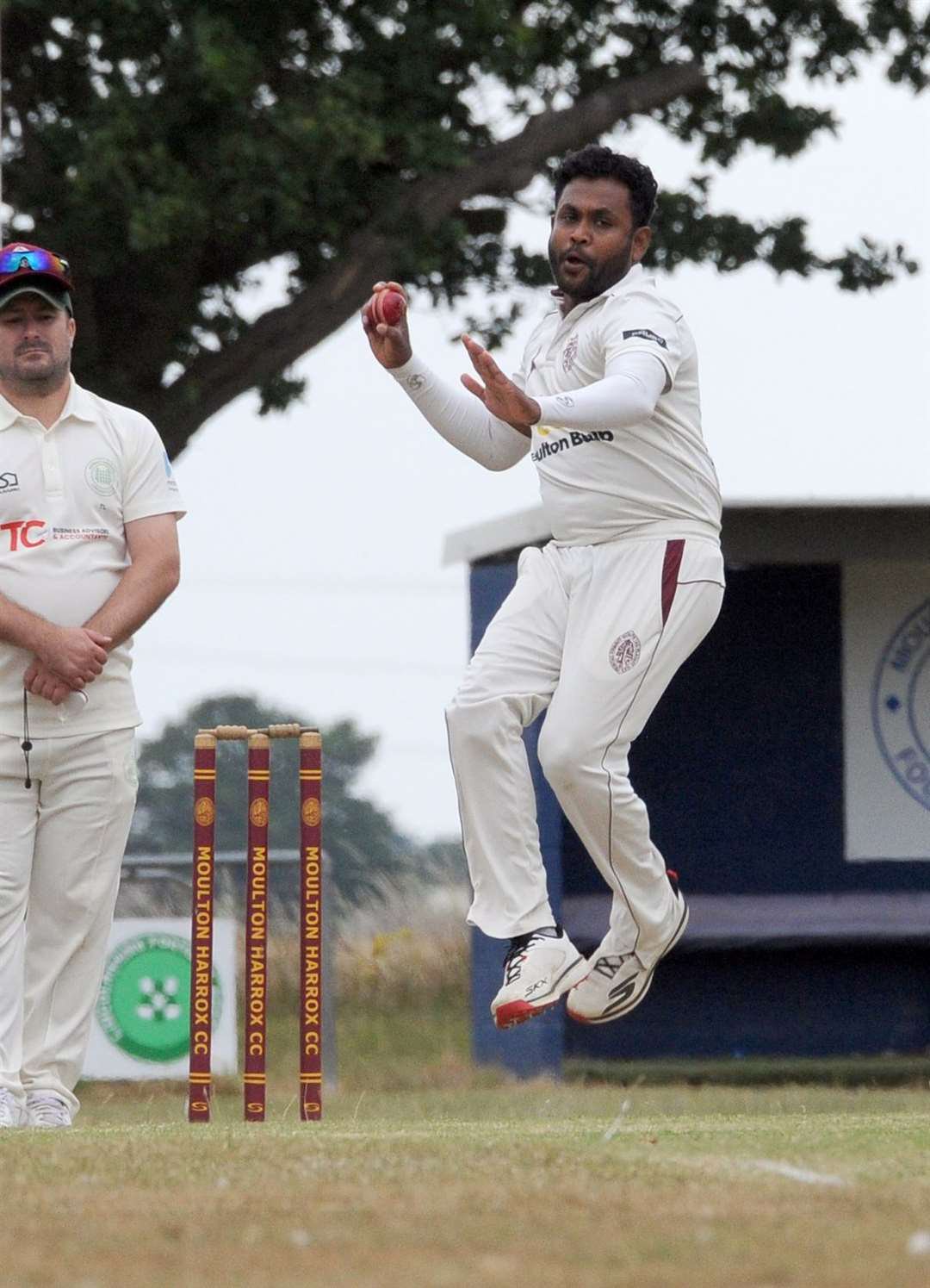 Eranda Munasinghege bowling. Photo: Chris Lowndes