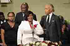 Bettersten Wade speaks to the attendees of her son Dexter Wade’s funeral service in 2023. Looking on are the Rev. Al Sharpton, right, and civil rights attorney Ben Crump, background.