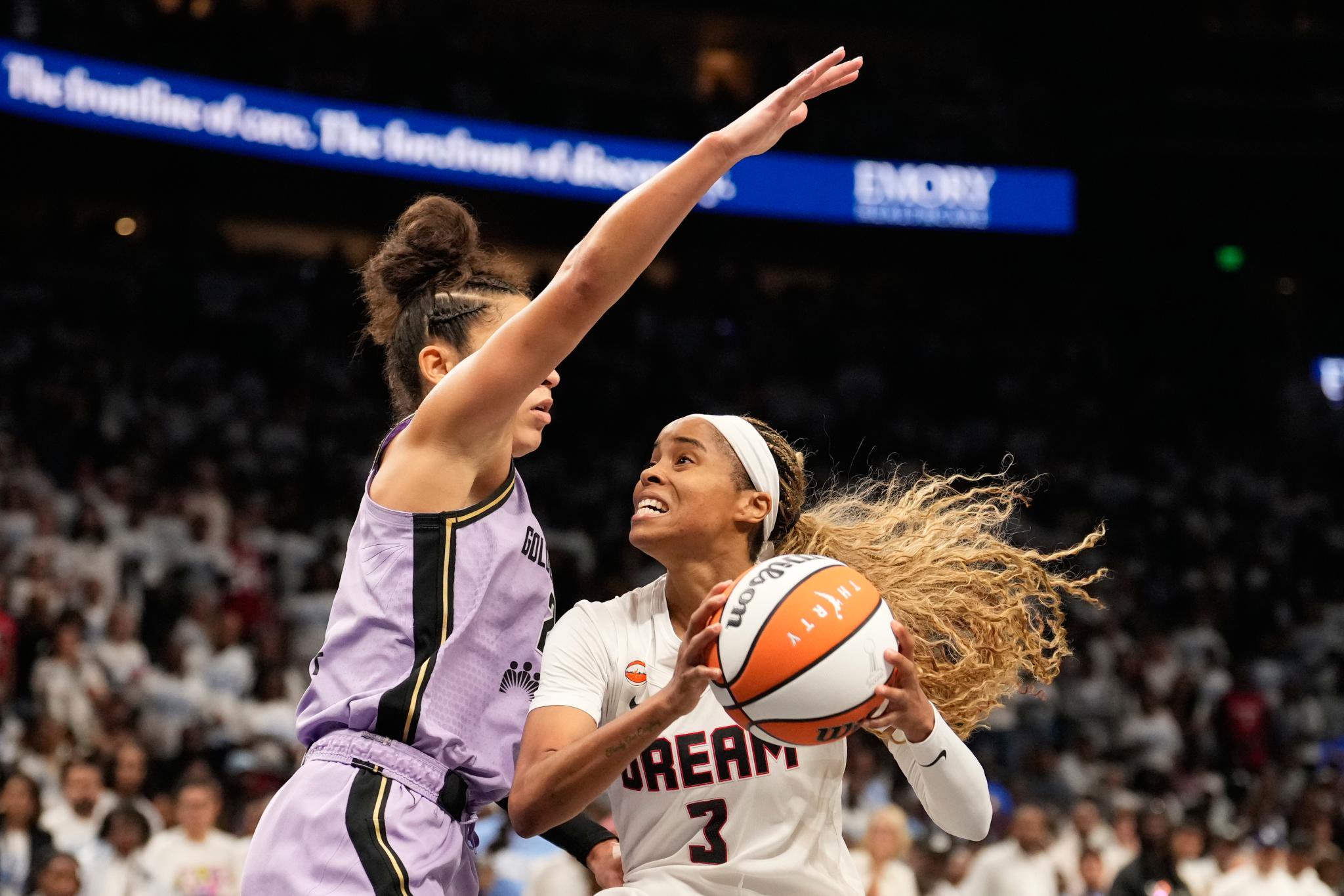Atlanta Dream guard Jordin Canada (3) attempts to shoot against Golden State Valkyries guard Veronica Burton (22) during Game 4 of the WNBA finals.