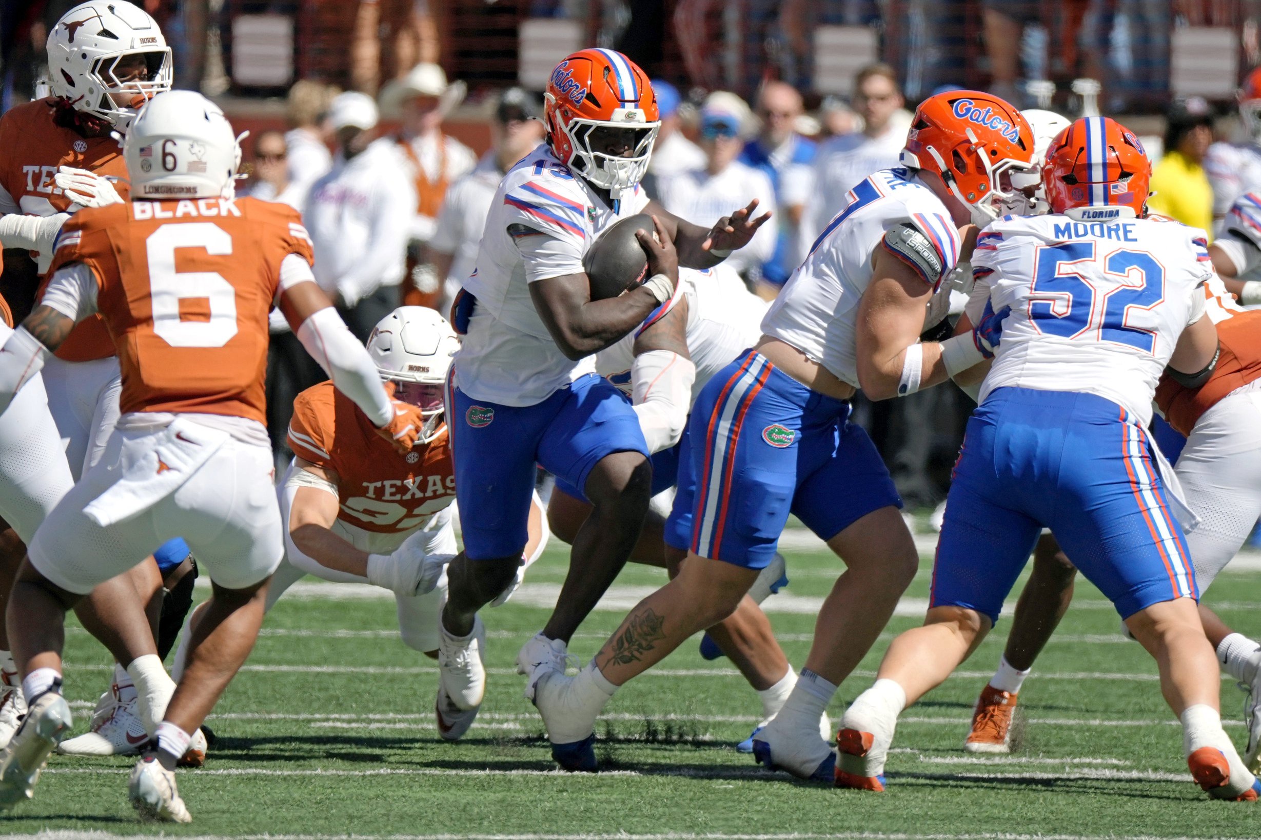 Oct 17, 2026; Austin, Texas, USA;  Florida Gators running back Jadan Baugh (13) runs for yards during the first half against the Texas Longhorns at Darrell K Royal-Texas Memorial Stadium.  Mandatory Credit: Scott Wachter-Imagn Images