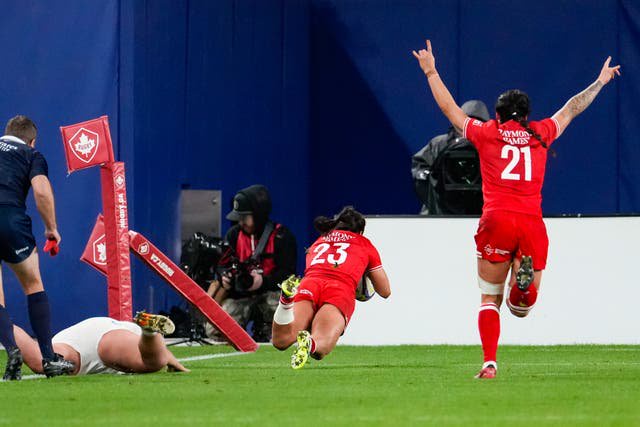 Canada's Shoshanah Seumanutafa (23) dives to make a try