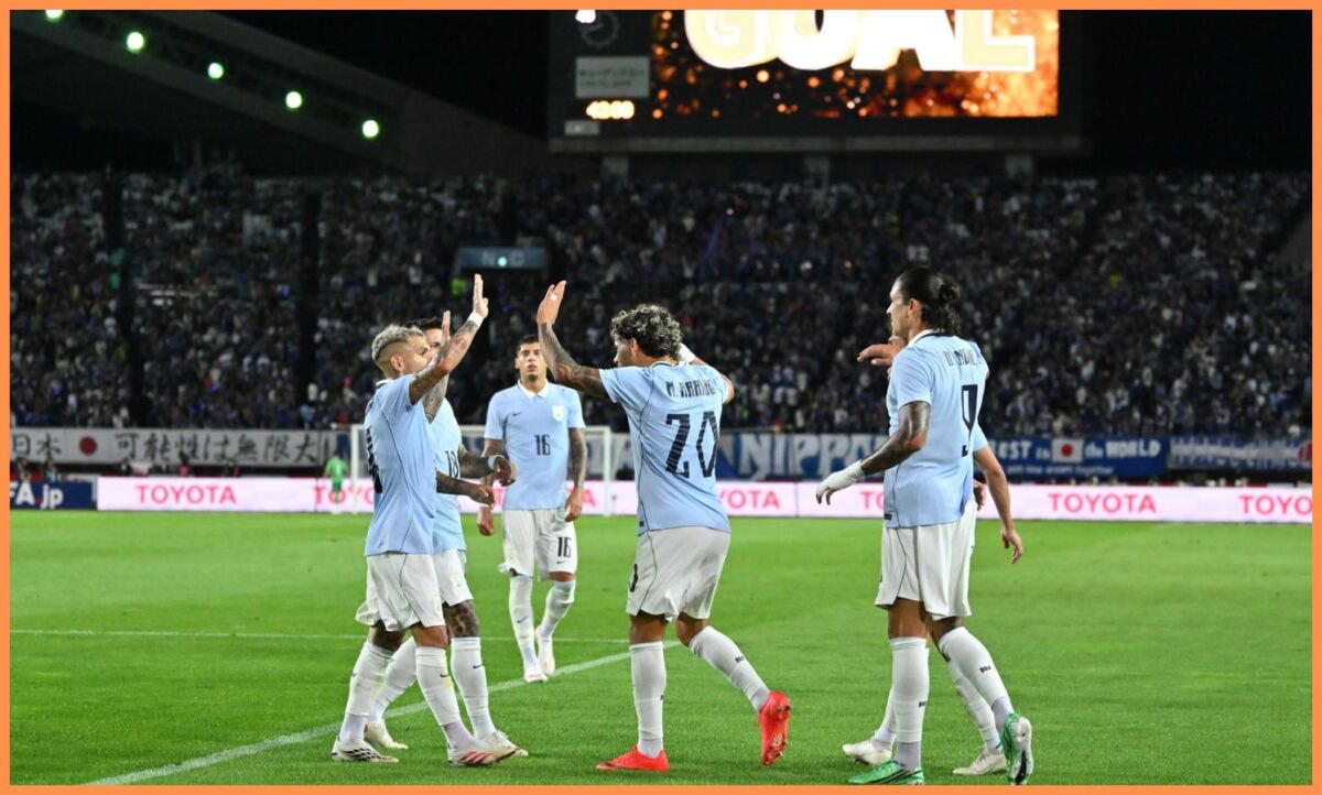 Maxi Araujo celebrates with his Uruguay teammates