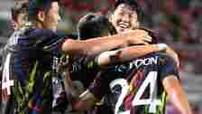 Hwang Hee-Chan & Son Heung-Min of South Korea celebrates with their team