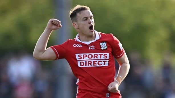 Steven Sherlock of Cork celebrates kicking a two-point score during the GAA Football All-Ireland Senior Championship Round 1 match between Cork and Meath at Páirc Uí Rinn in Cork. 