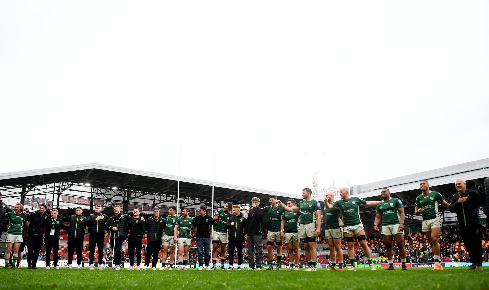 London Irish huddle after their last Premiership Rugby match against Exeter Chiefs at Gtech Community Stadium in May 2023. Photograph: Alex Davidson/Getty Images