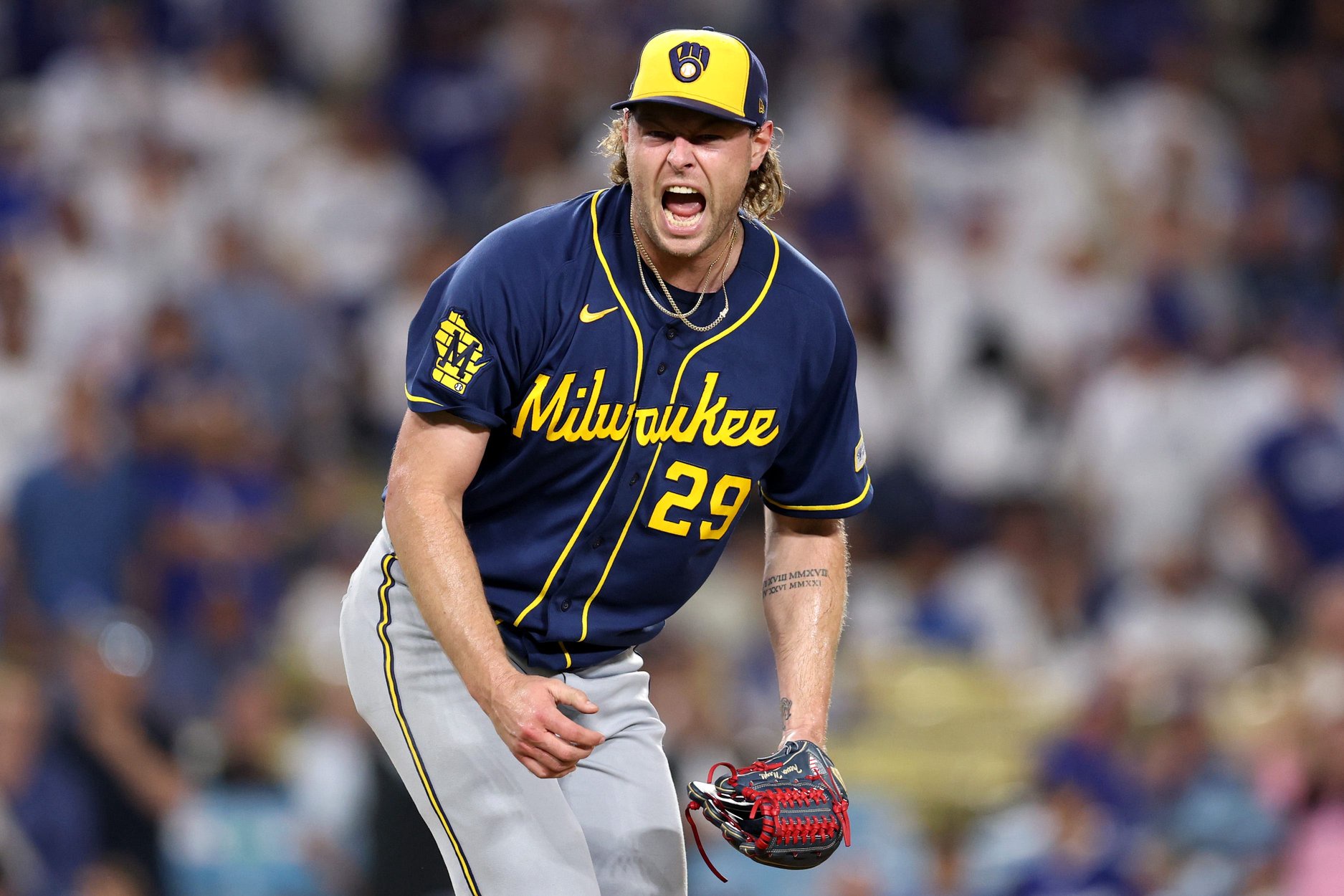 Trevor Megill #29 of the Milwaukee Brewers celebrates after defeating the Los Angeles Dodgers in game three of the National League Championship Series at Dodger Stadium on October 14, 2026 in Los Angeles, California.
