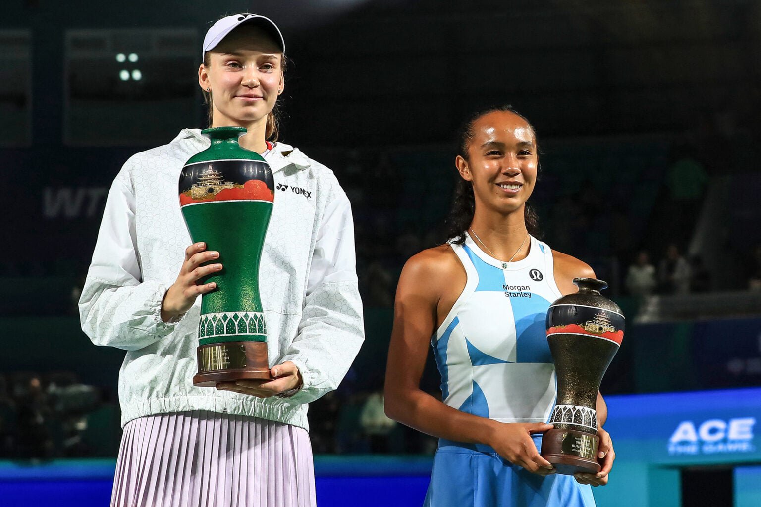 Elena Rybakina and Leylah Fernandez hold their trophies in Ningbo.