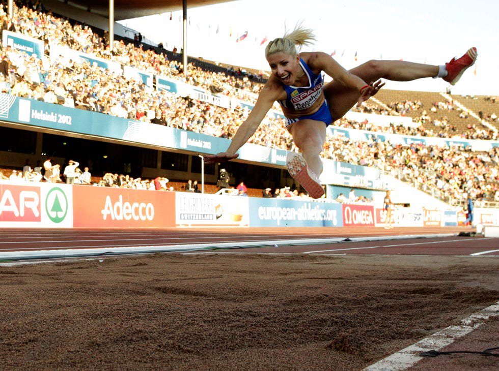 track and field athletics, sport venue, jumping, human leg, playing sports, competition event, sports, logo, championship, stadium,