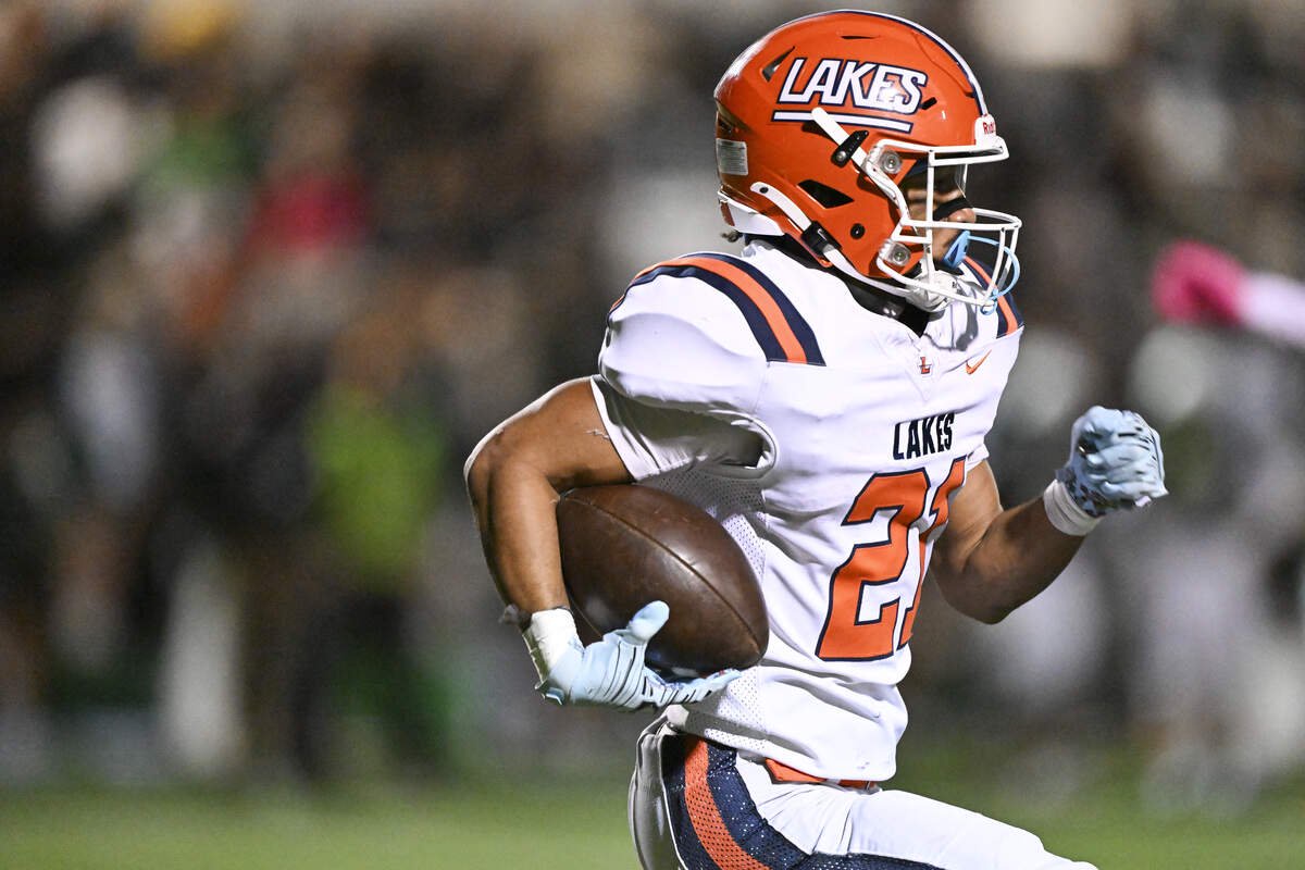 Lakes running back Korben Reed (21) carries the ball during a game against Peninsula on Friday, Oct. 23, 2026, at Roy Anderson Field in Gig Harbor, Wash.