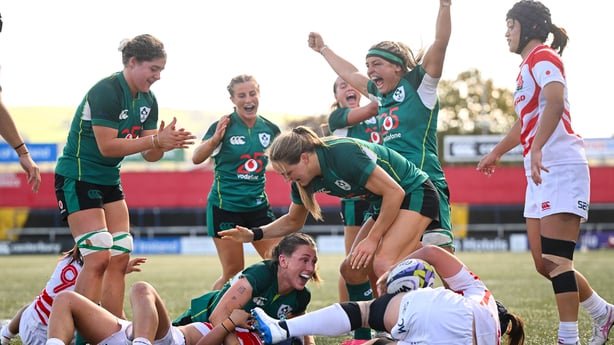 Anna McGann of Ireland celebrates with team-mates after scoring a try during the International Women's Rugby fixture between Ireland and Japan at Virgin Media Park 