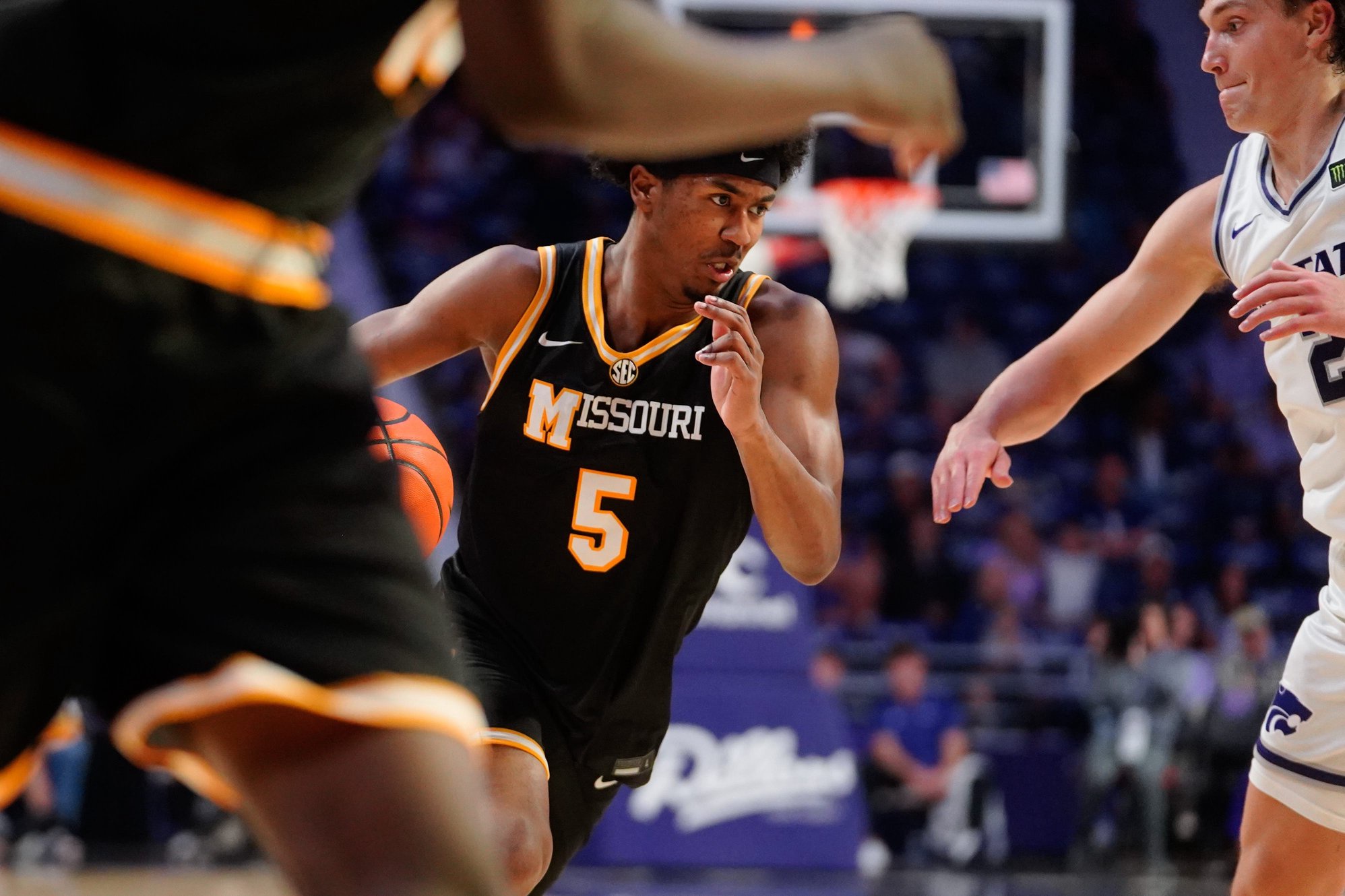 Missouri Tigers guard Jason Crowe Jr. (5) drives the ball against Kansas State Wildcats during the exhibition game inside Bramlage Coliseum in Manhattan, Kansas on Oct. 23, 2026.