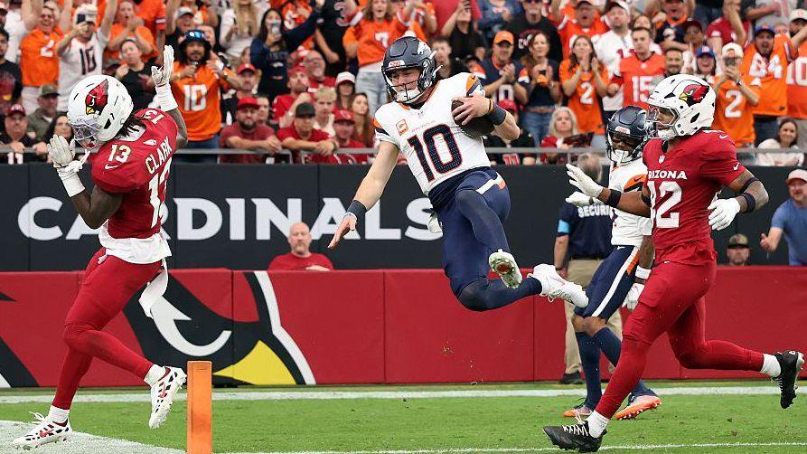 Bo Nix runs in for a touchdown for the Denver Broncos against the Arizona Cardinals in October 2026