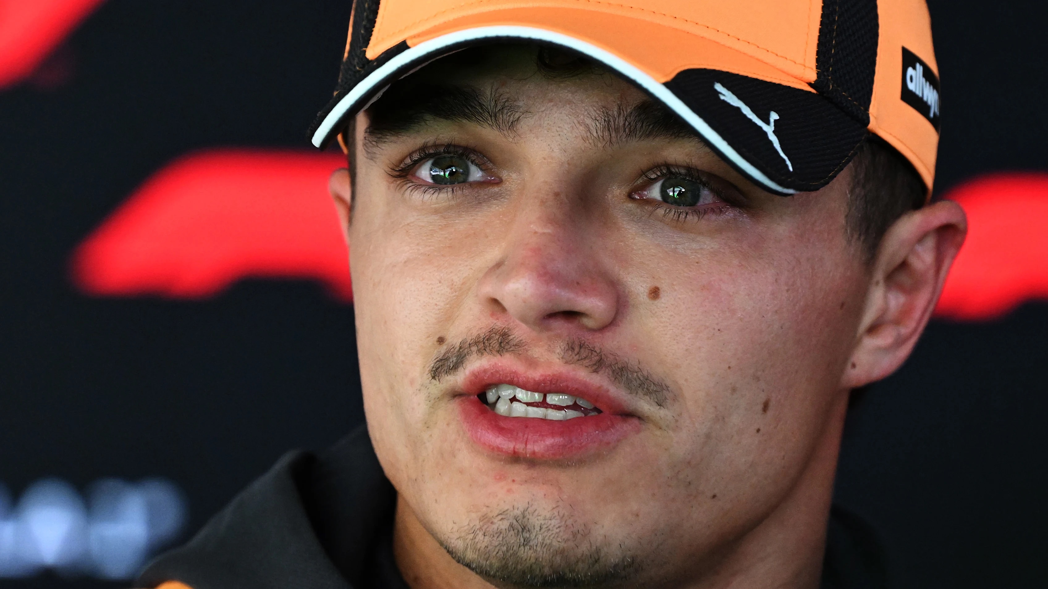 AUSTIN, TEXAS - OCTOBER 22: Lando Norris of Great Britain and McLaren talks to the media during