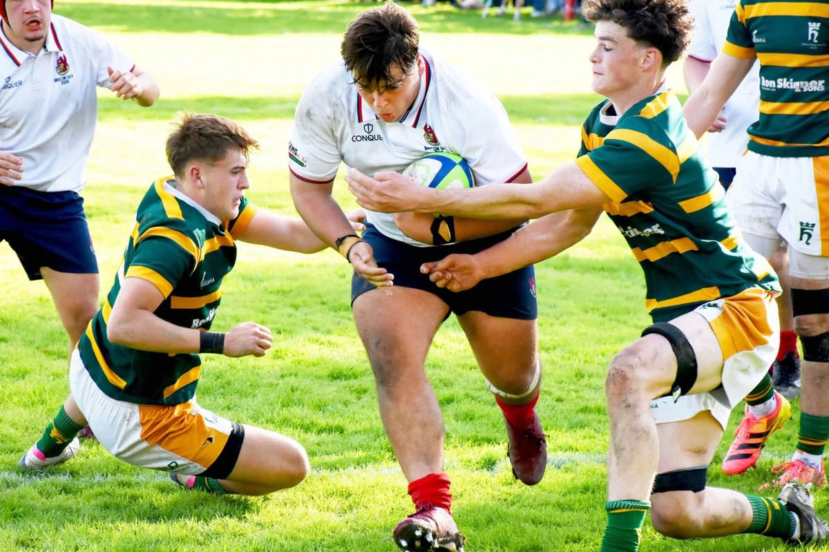 Ollie Tucker bursts through to score the first try for Llandovery