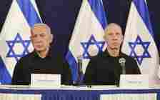 Prime Minister Benjamin Netanyahu (left) and Defense Minister Yoav Gallant attend a press conference at the Kirya military base in Tel Aviv, October 28, 2023. (Abir Sultan/Pool Photo via AP)