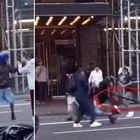 Migrants swing bats, belts and even traffic cones at each other in wild brawl outside NYC hotel