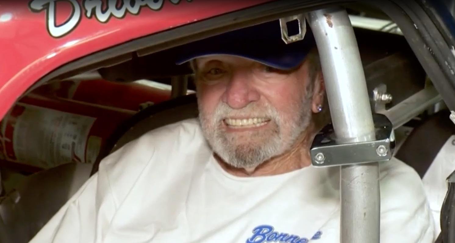 Gary Matranga sitting in the driver's seat of his race car.