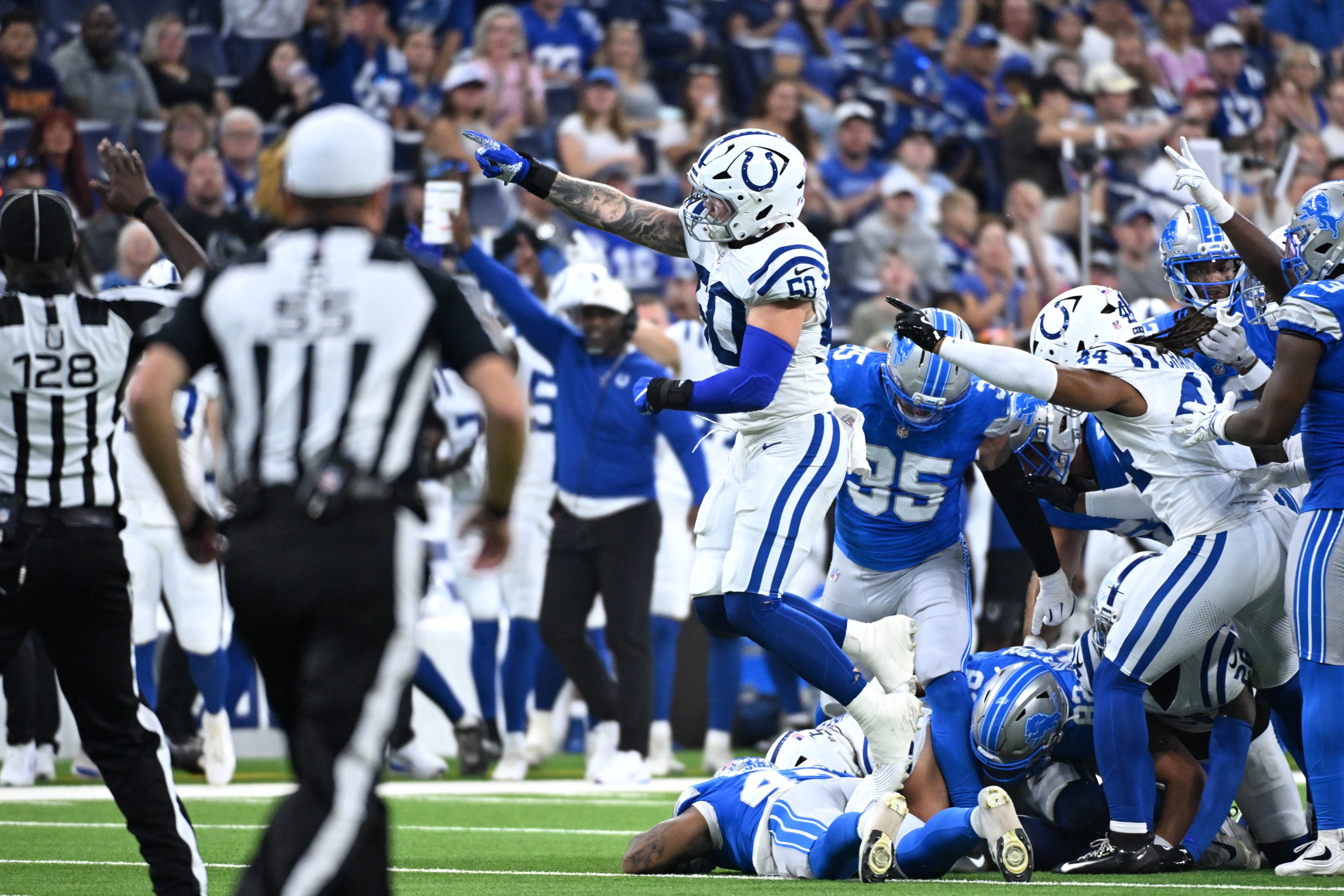 Aug 29, 2026; Indianapolis, Indiana, USA;  Indianapolis Colts linebacker Bryce Boettcher (50) reacts after a fumble recovery for a turnover against the Detroit Lions during the first half at Lucas Oil Stadium.  Mandatory Credit: Robert Goddin-Imagn Images