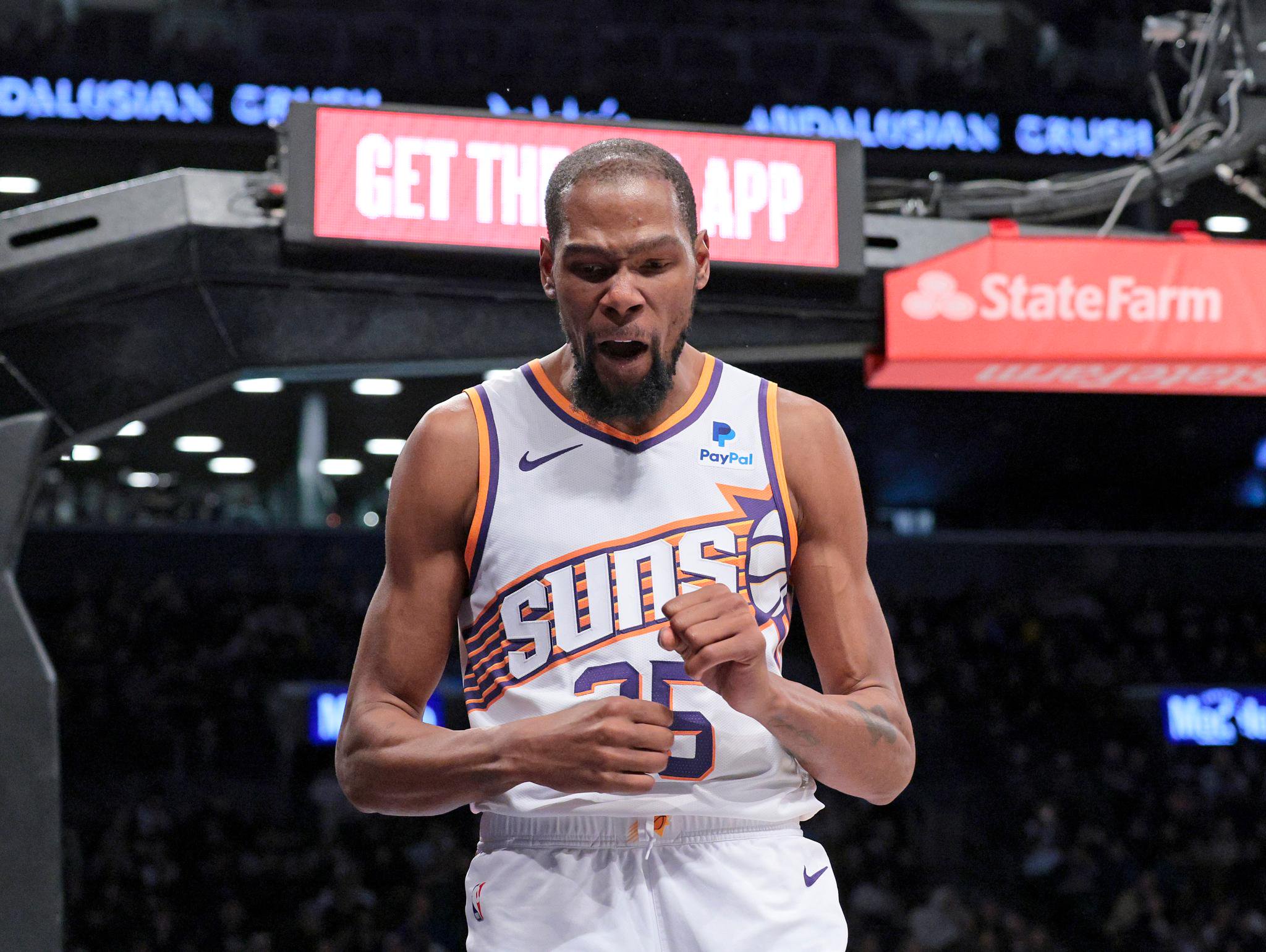 Kevin Durant #35 of the Phoenix Suns reacts during the fourth quarter.