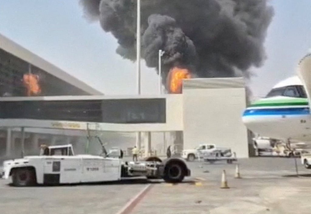 Smoke and flames rise from Riyadh international airport, after Houthis attacked the facility on October 8. Photo: Reuters