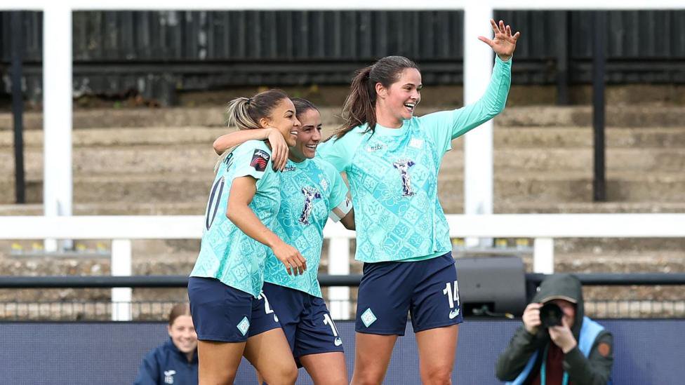 Delphine Cascarino, Danielle van de Donk and Freya Godfrey celebrate