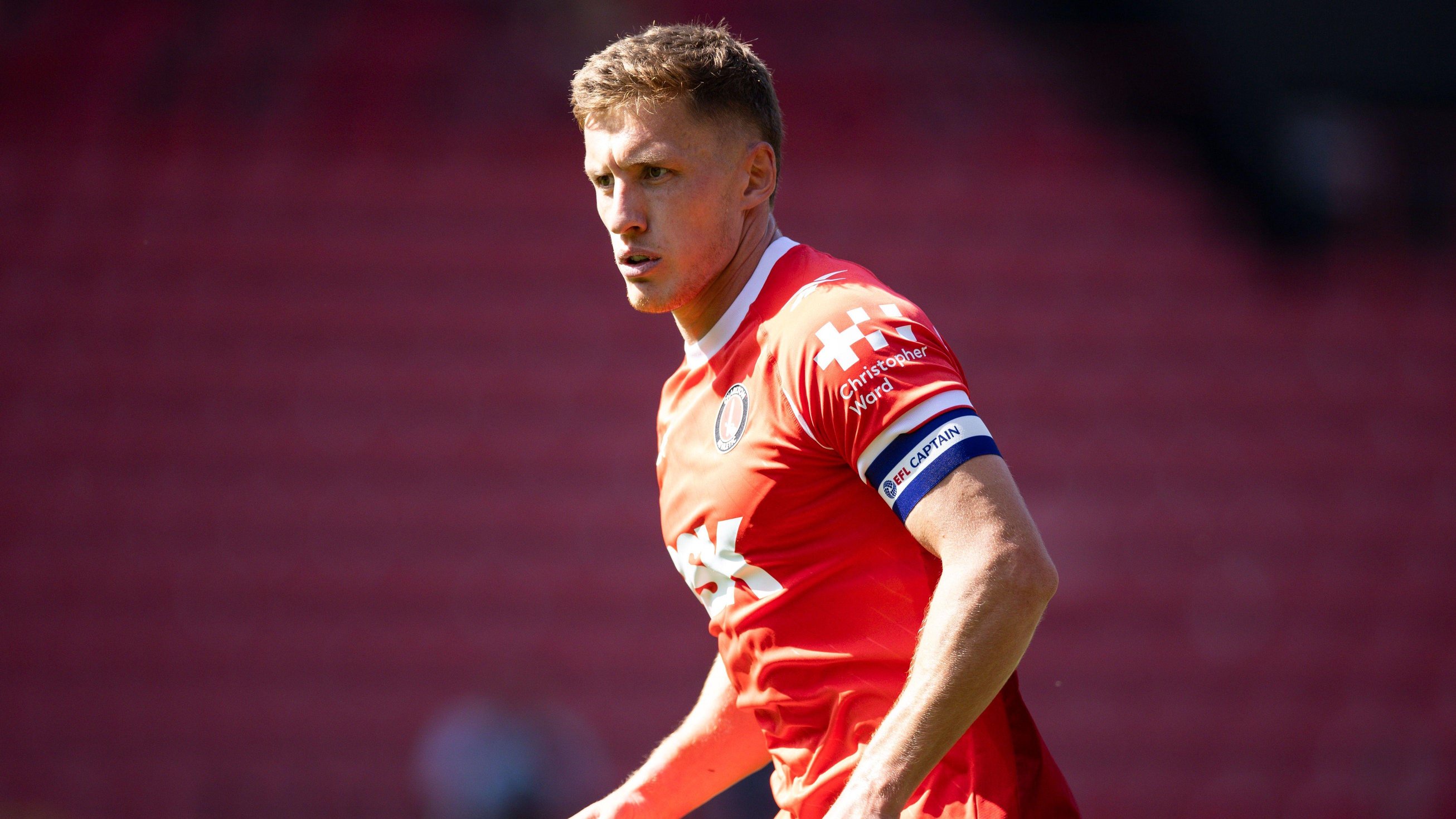 Greg Docherty, wearing the captain's armband, playing in a pre-season friendly against Reading for Charlton Athletic in August.