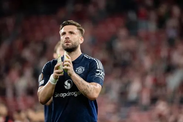 Luke Shaw applauds Manchester United's fans after the win over Athletic Bilbao in Spain.