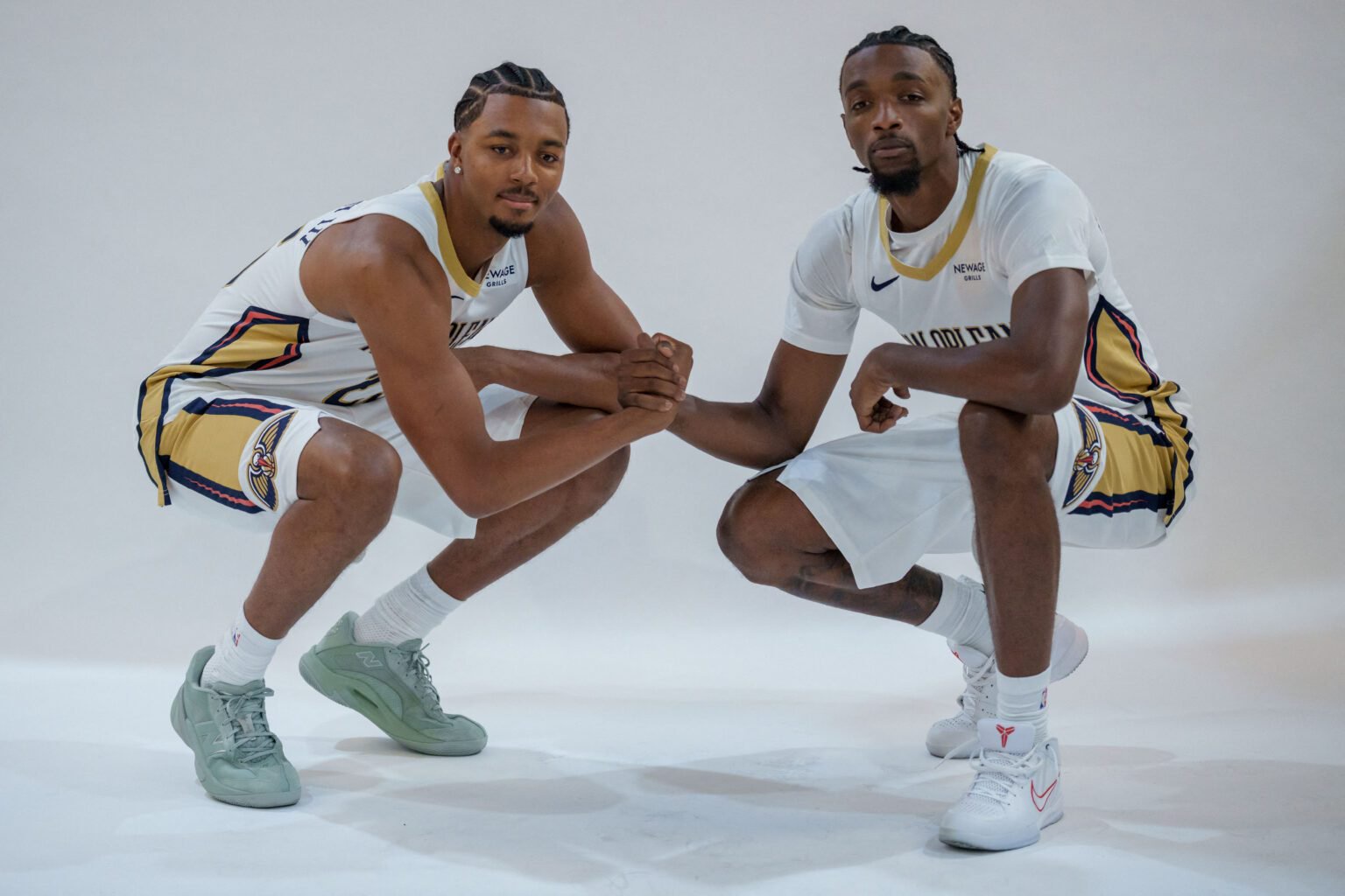 New Orleans Pelicans forward Trey Murphy III (25) and New Orleans Pelicans guard/forward Herb Jones (2) pose during media day in the Smoothie King Center in New Orleans, LA, USA;