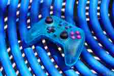 The GameSir Nova game controller on a blue table.