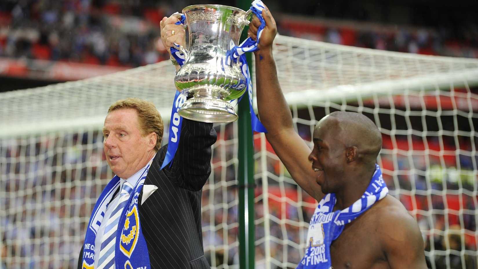 Football - Cardiff City v Portsmouth - FA Cup Final - Wembley Stadium - 07/08 - 17/5/08 Portsmouth Manager Harry Redknapp and Lassana Diarra (R) celebrate victory with the FA Cup Mandatory Credit: Action Images / Tony O'Brien