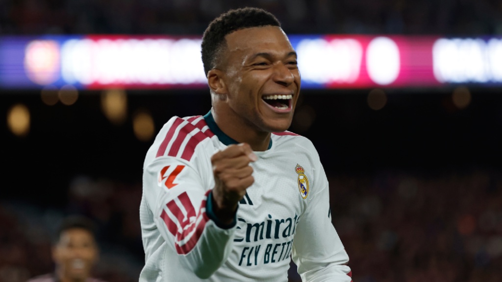 Real Madrid's Kylian Mbappe celebrates after scoring his side's opening goal during a Spanish La Liga soccer match between FC Barcelona and Real Madrid in Barcelona, Spain, Sunday, Oct. 25, 2026. (AP Photo/Joan Monfort)