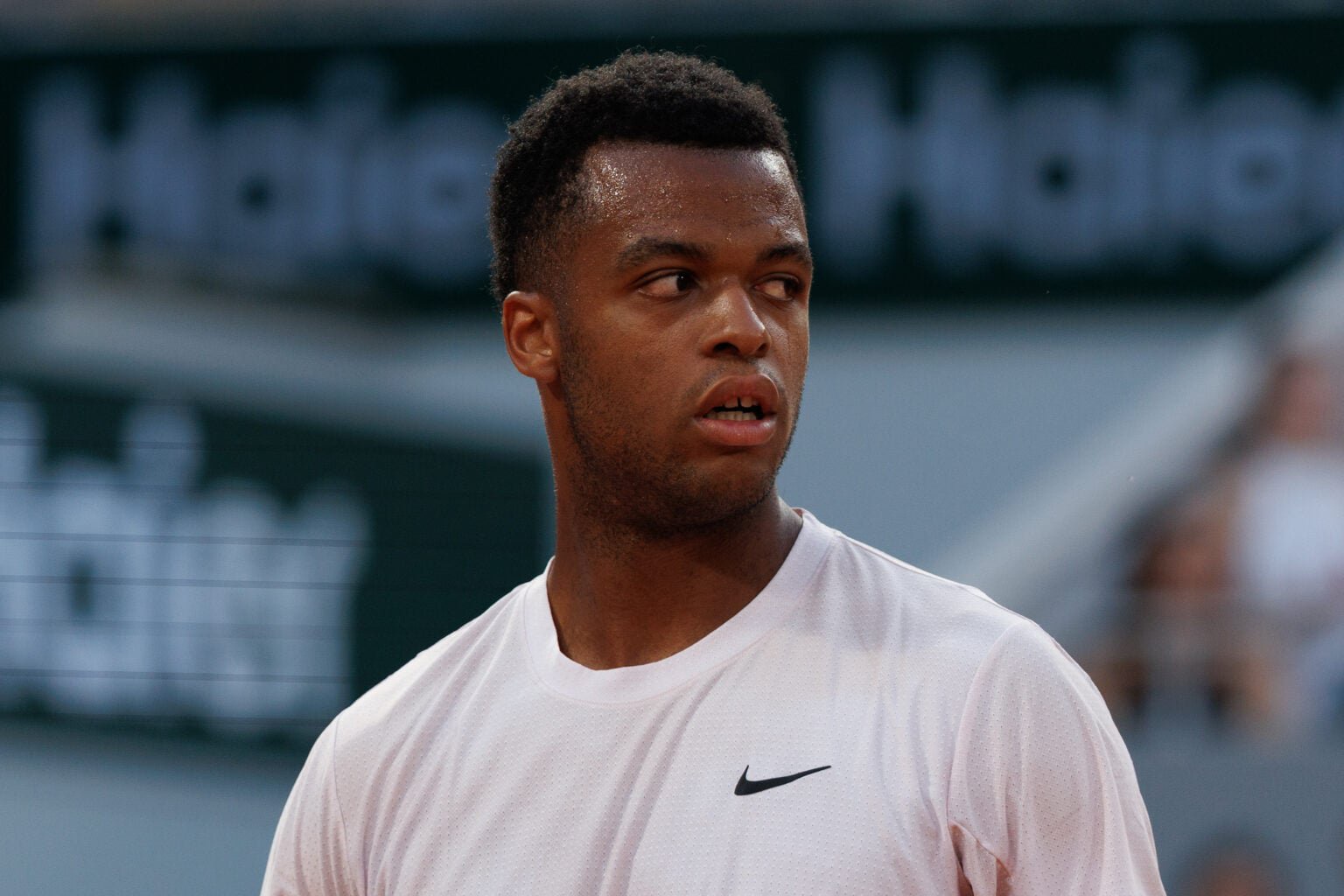 Giovanni Mpetshi Perricard looks on at Roland Garros.