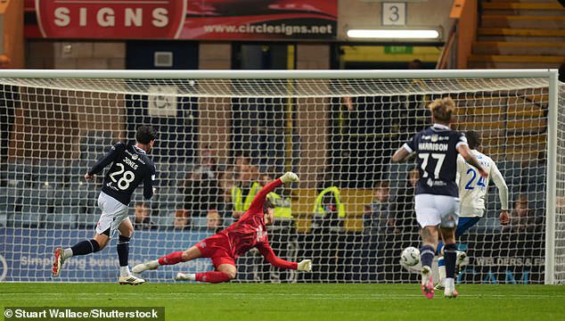 Callum Jones slots home past Ivor Pandur to level the scores again at 2-2