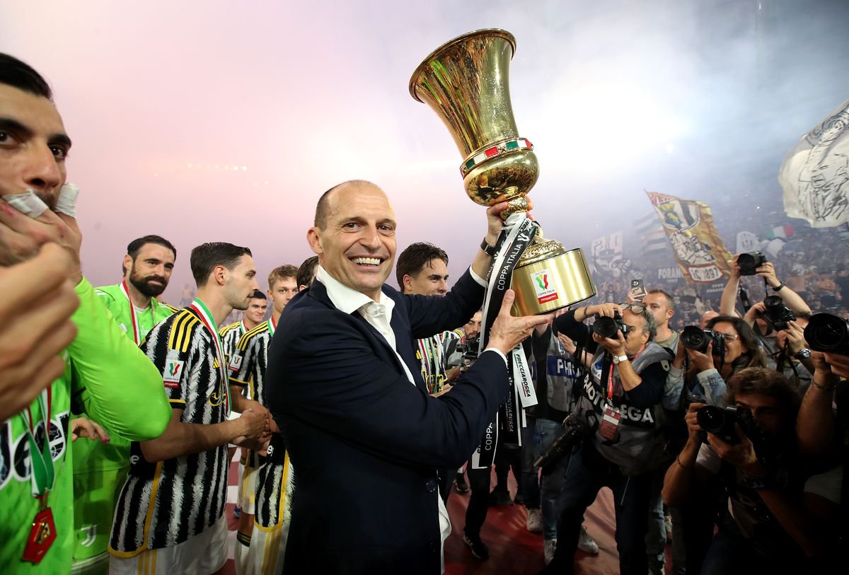 Massimiliano Allegri, Head Coach of Juventus, lifts the Coppa Italia trophy after the team's victory during the Coppa Italia 2023/2024 Final match between Atalanta BC and Juventus FC