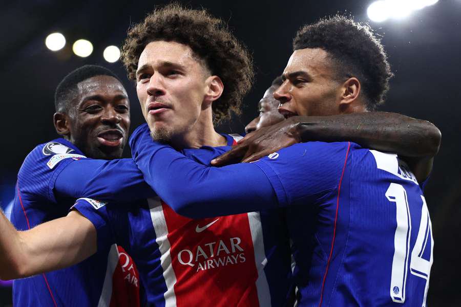 Maghnes Akliouche celebrates with teammates after scoring PSG's fourth goal