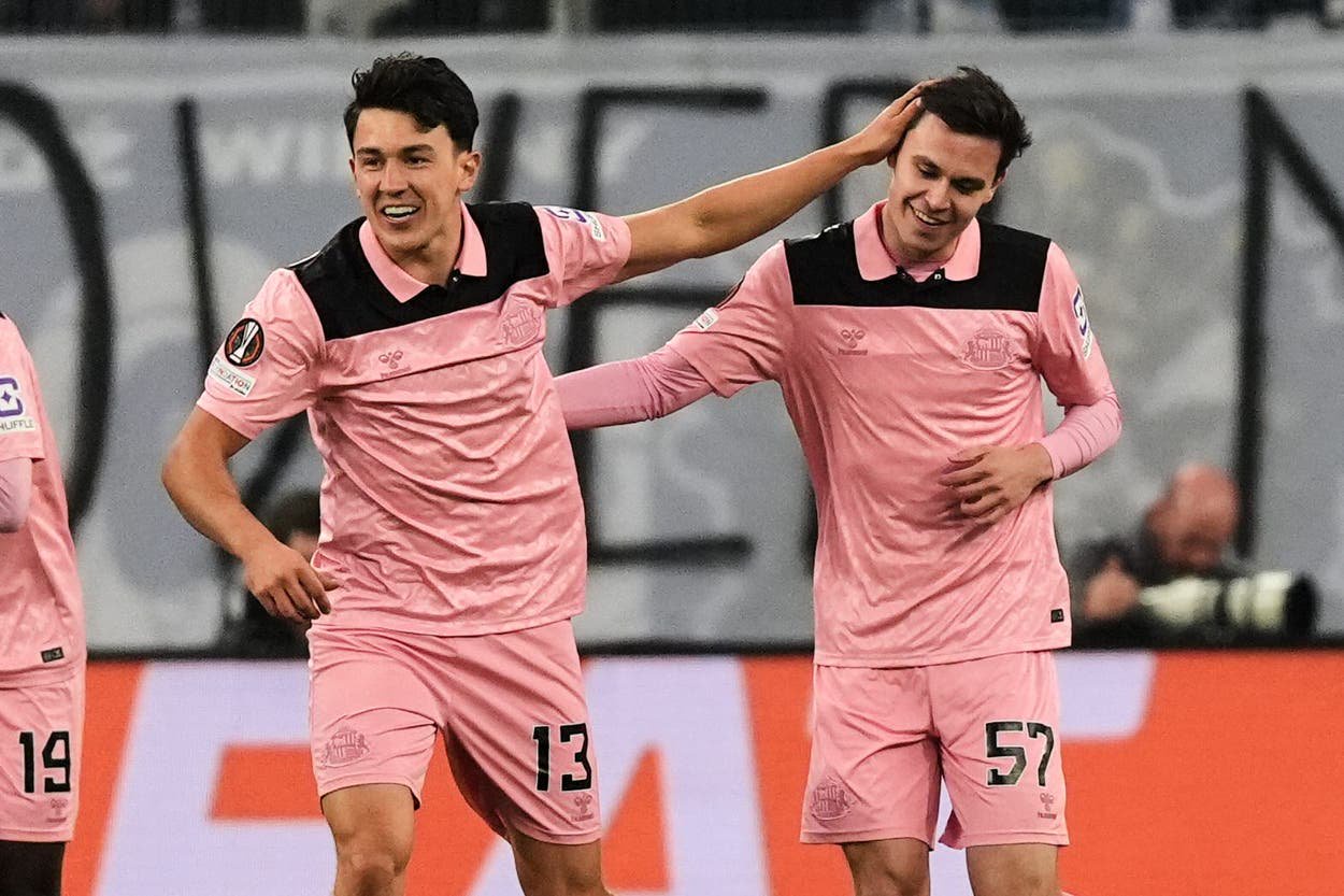 Luke O’Nien, left, and Timor Tutierov celebrate Sunderland’s opener (Piotr Hawalej/AP)
