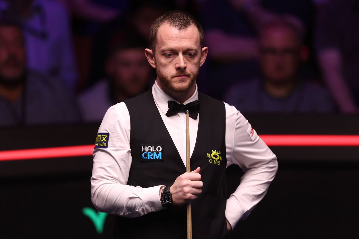 Mark Allen stands with a cue in his hand